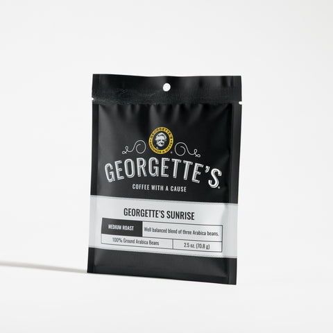 A single stand-up pouch of Georgette's Sunrise medium roast blend, shown on a clean white background.