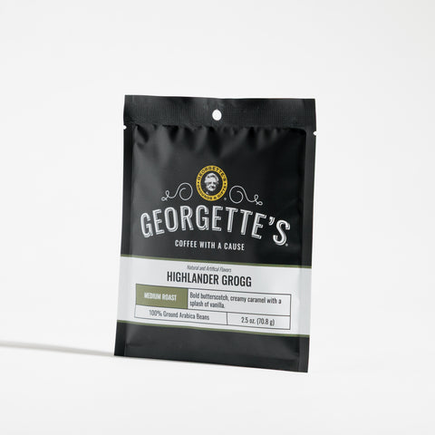A single stand-up pouch of Georgette's Highlander Grogg, medium roast, shown on a clean white background.

